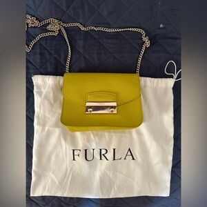 Used conditions yellow furla crossbody